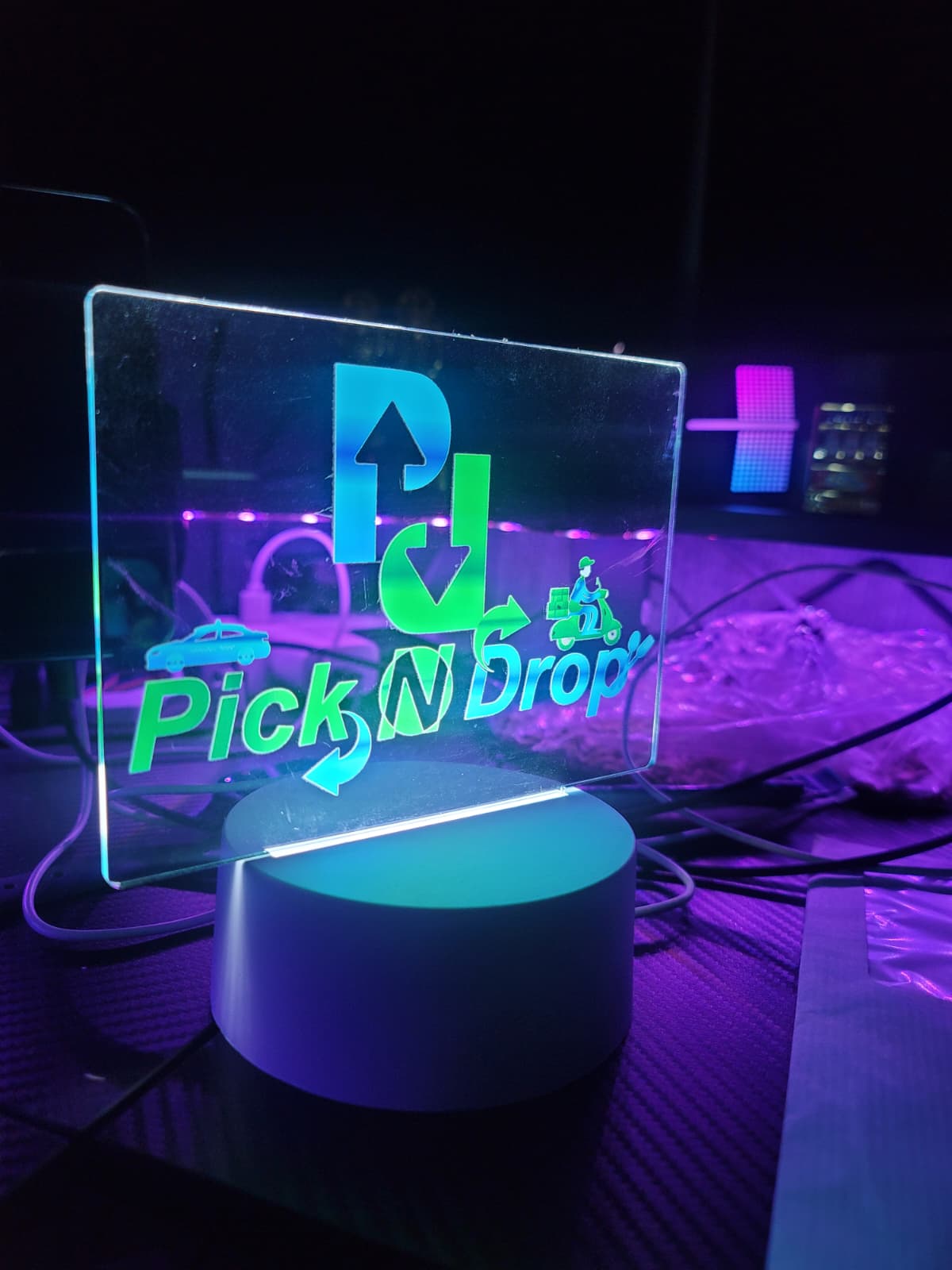 Pick N Drop dashboard emblem